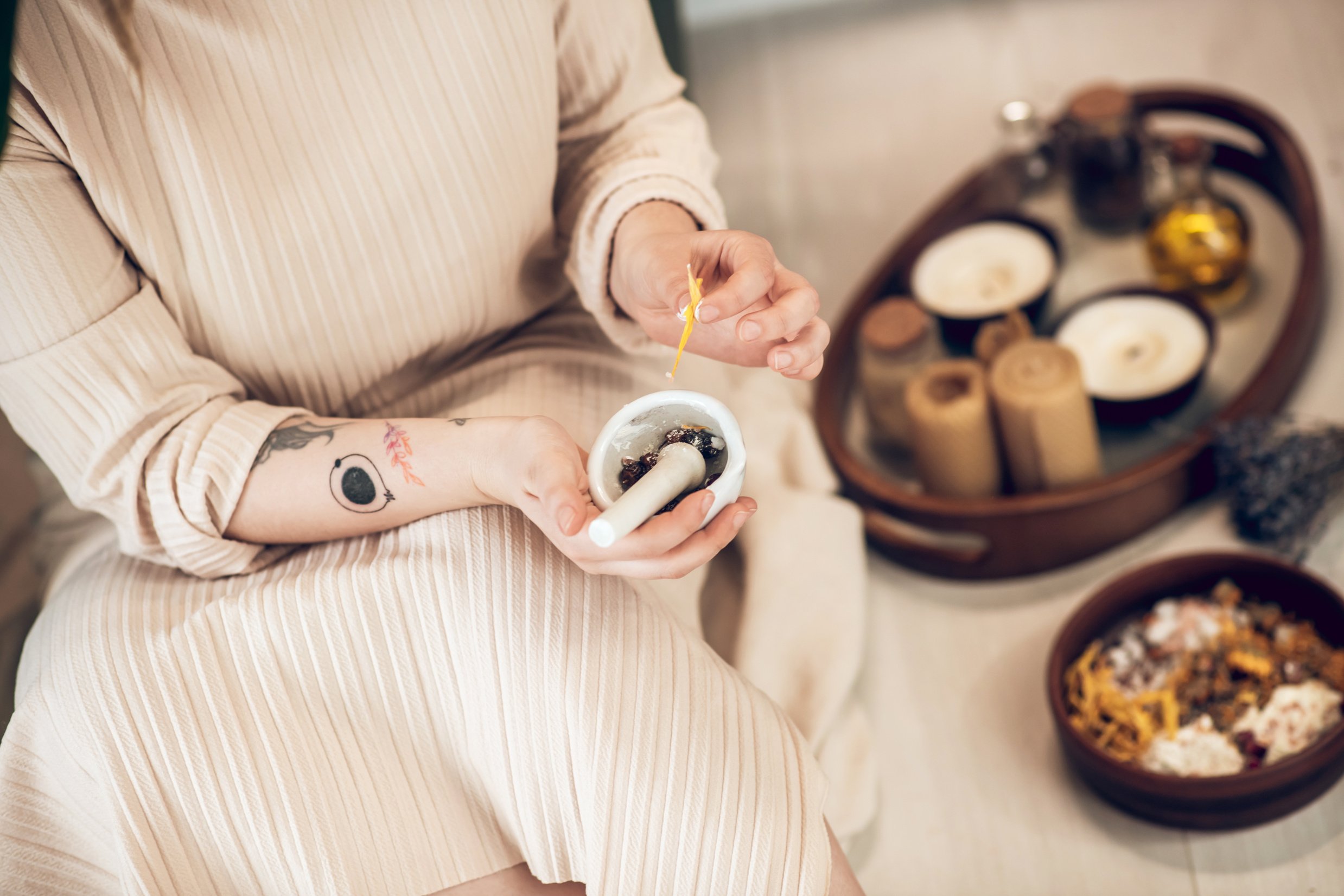 Ayurvedic Therapist Busy Preparing Medicine